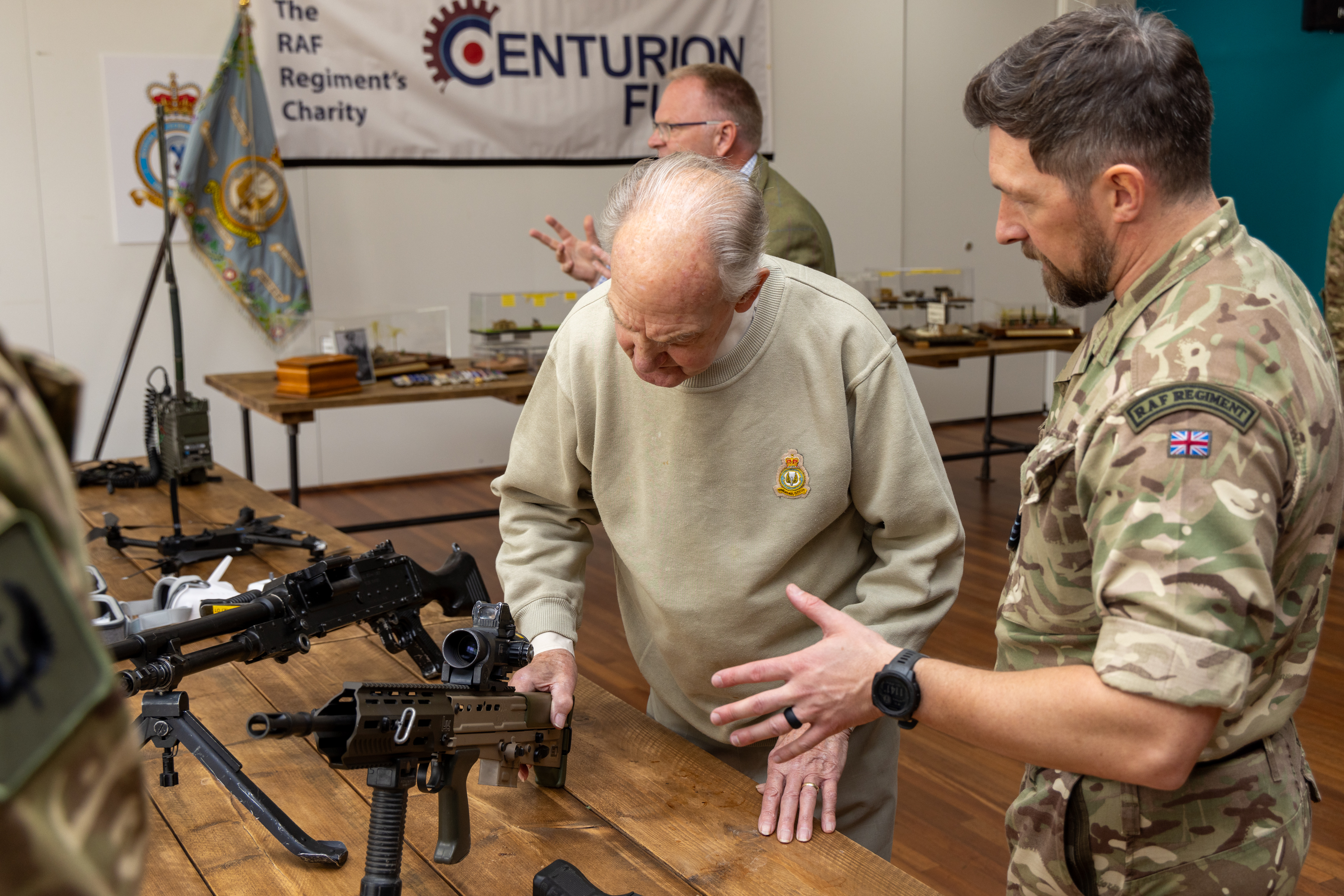 Photo: Mr Hill viewing up-to-date weapons and equipment